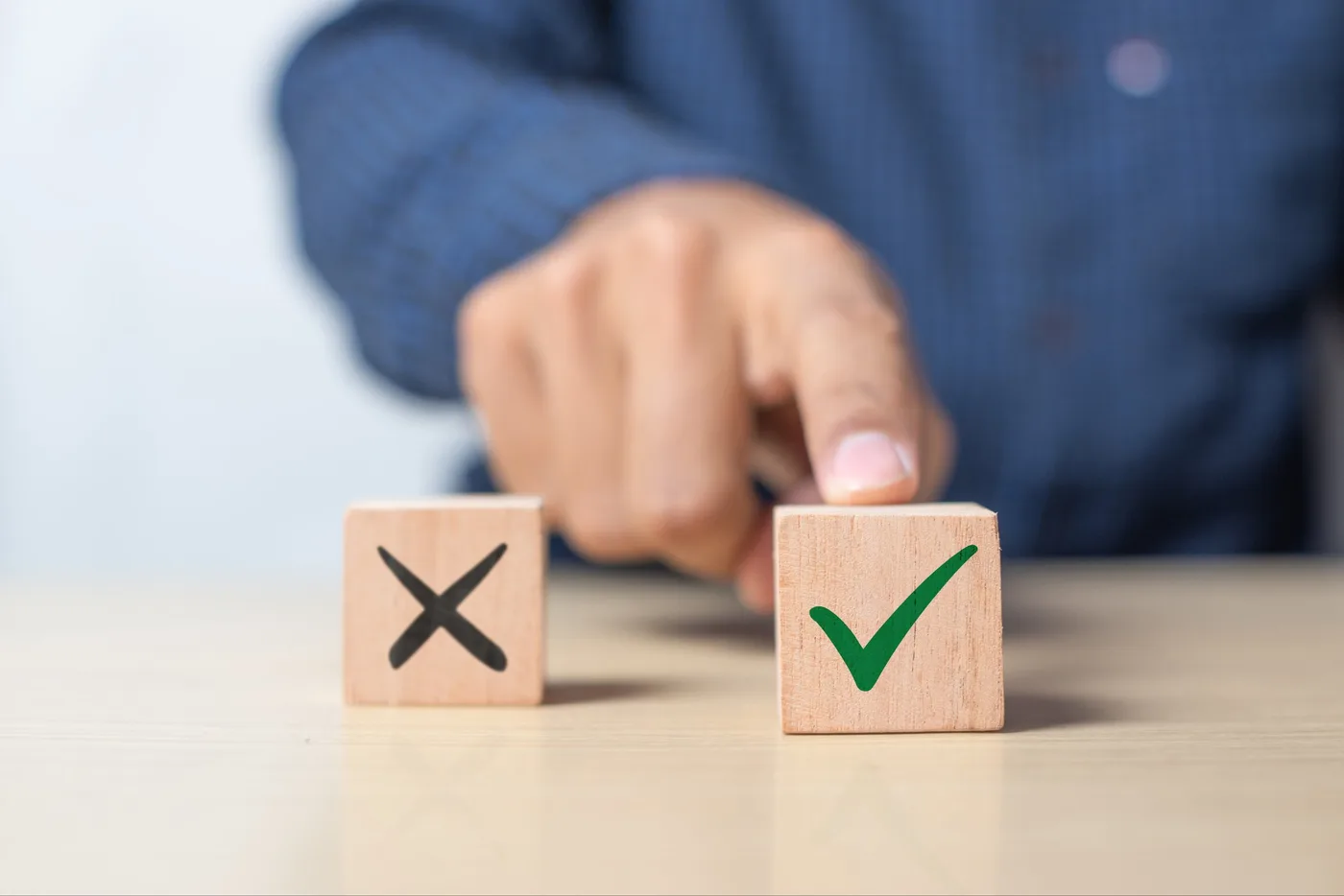 A man choosing between a checkmark