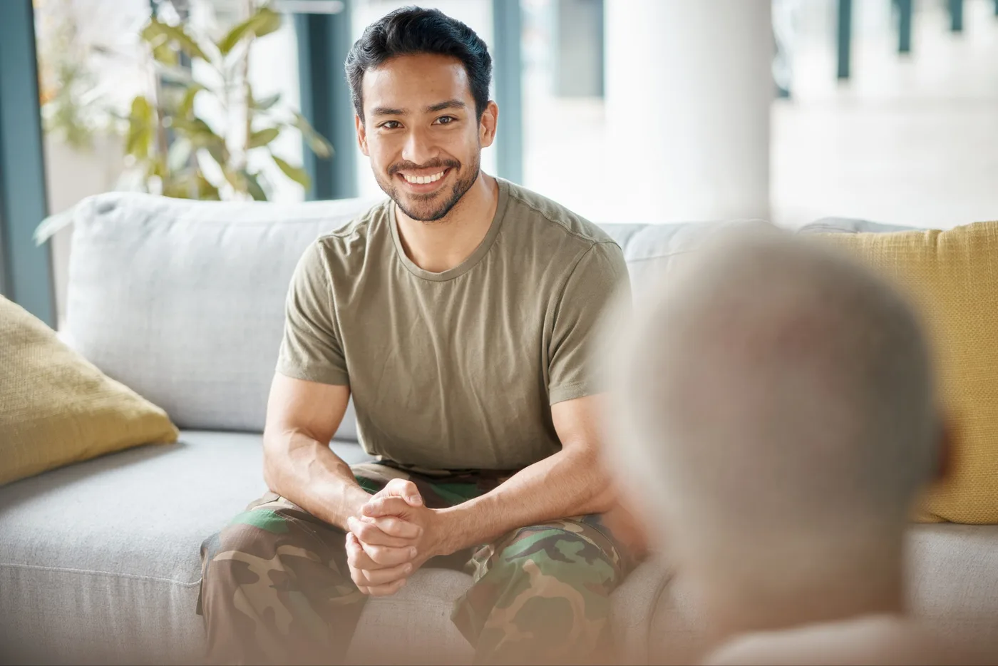 man with psychologist for therapy